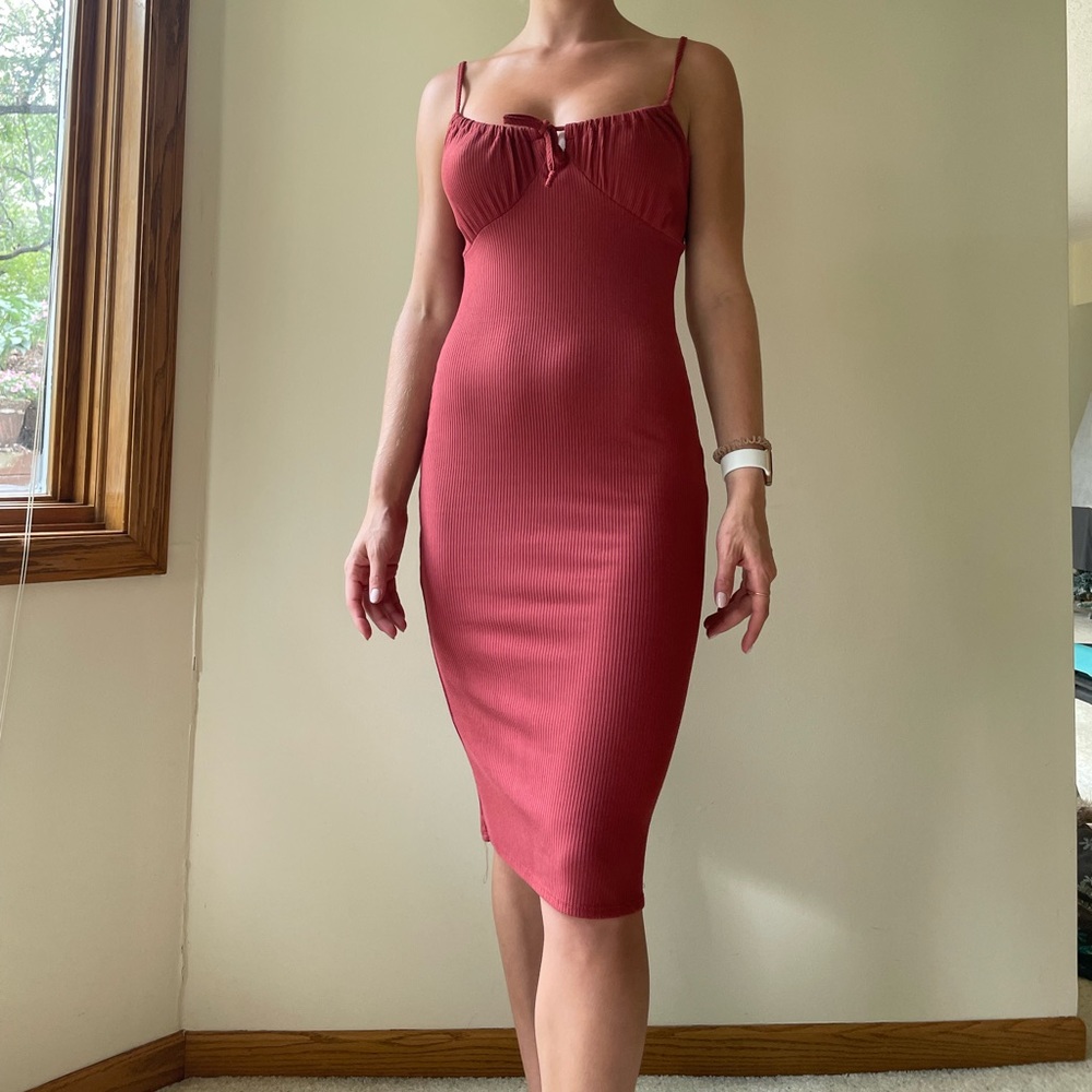 Maroon bodycon dress.